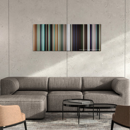 Sorry to Bother You color palette canvas on a concrete wall above a gray sectional sofa