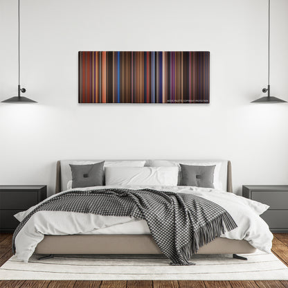 Rock of Ages color palette canvas above a bed, between two black pendant lamps