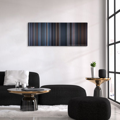 Hannibal color palette canvas above a black sofa with a gold-topped table