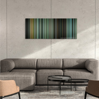 The Bourne Supremacy color palette canvas on a concrete wall above a gray sectional sofa