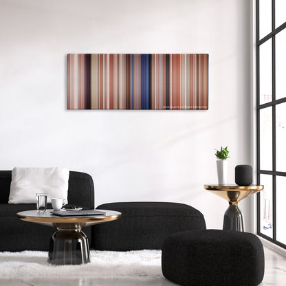 Pretty in Pink color palette canvas above a black sofa with a gold-topped table