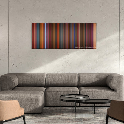 Cats color palette canvas on a concrete wall above a gray sectional sofa