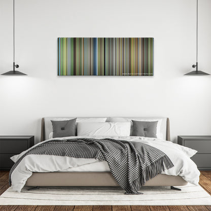 The New World color palette canvas above a bed, between two black pendant lamps