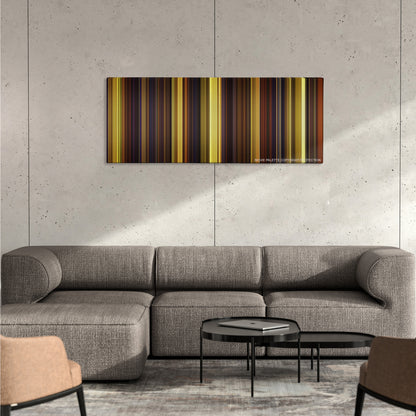 Magic Mike color palette canvas on a concrete wall above a gray sectional sofa