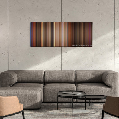 The Birdcage color palette canvas on a concrete wall above a gray sectional sofa