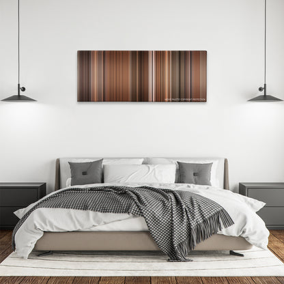 Before Sunset color palette canvas above a bed, between two black pendant lamps