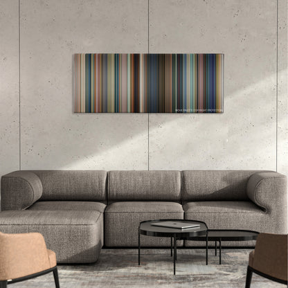 Baby Driver color palette canvas on a concrete wall above a gray sectional sofa