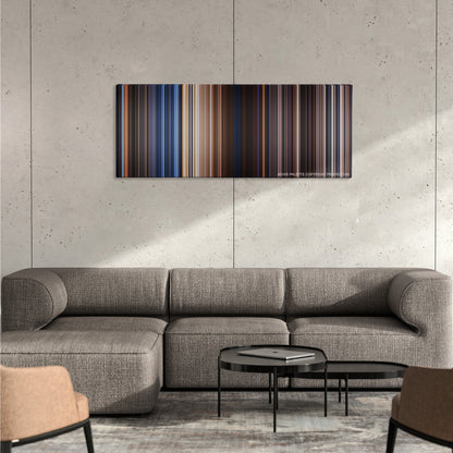 Stargate color palette canvas on a concrete wall above a gray sectional sofa