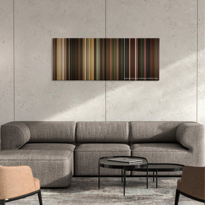 The Muppets color palette canvas on a concrete wall above a gray sectional sofa