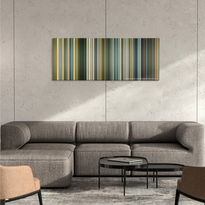 Slumdog Millionaire color palette canvas on a concrete wall above a gray sectional sofa