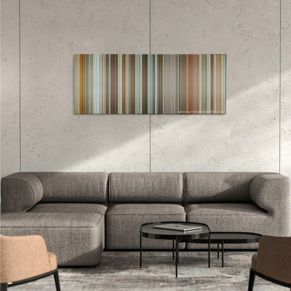 The Invention of Lying color palette canvas on a concrete wall above a gray sectional sofa