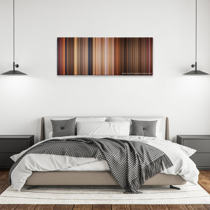 The Birdcage color palette canvas above a bed, between two black pendant lamps