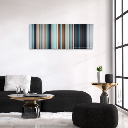 Free Willy color palette canvas above a black sofa with a gold-topped table