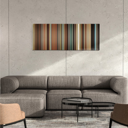 Pride & Prejudice color palette canvas on a concrete wall above a gray sectional sofa
