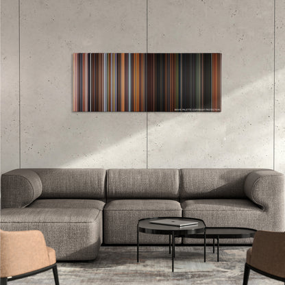 What Dreams May Come color palette canvas on a concrete wall above a gray sectional sofa