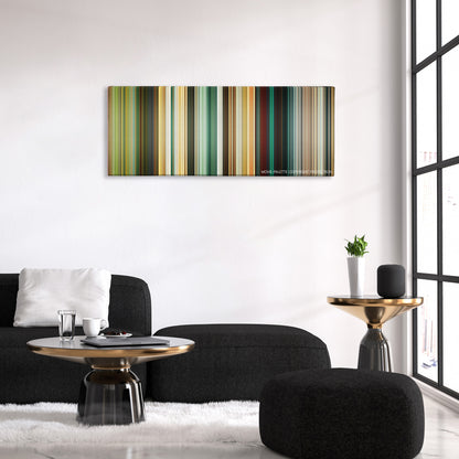 The Losers color palette canvas above a black sofa with a gold-topped table