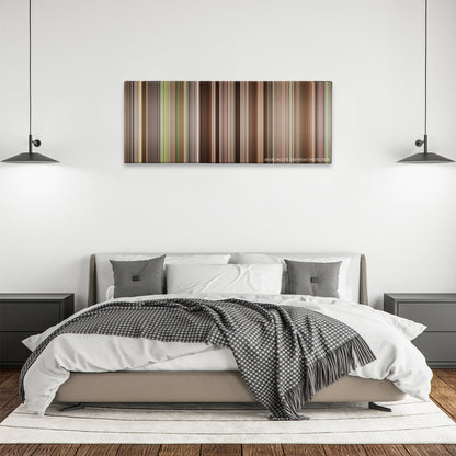 A League of Their Own color palette canvas above a bed, between two black pendant lamps