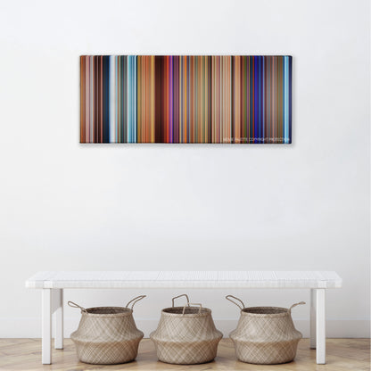 The Road to El Dorado color palette canvas above a white bench with three woven baskets