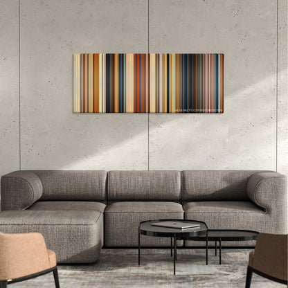 Paddington 2 color palette canvas on a concrete wall above a gray sectional sofa