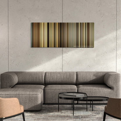 42 color palette canvas on a concrete wall above a gray sectional sofa