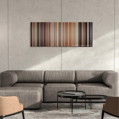 The Parent Trap color palette canvas on a concrete wall above a gray sectional sofa