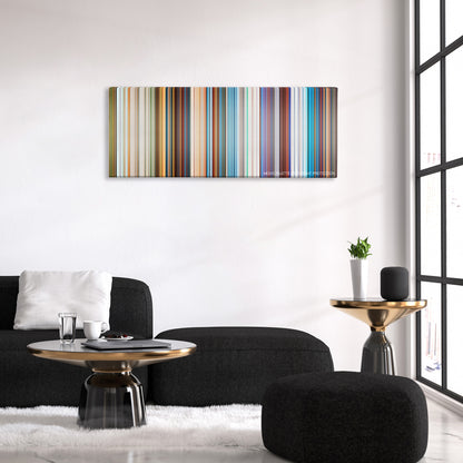 Balto color palette canvas above a black sofa with a gold-topped table