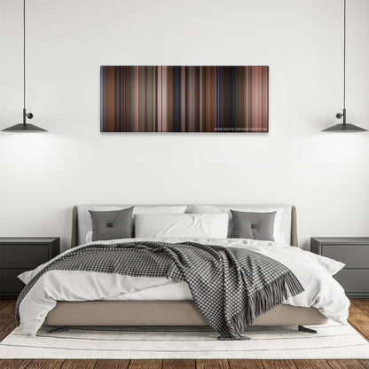 Moonstruck color palette canvas above a bed, between two black pendant lamps