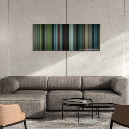 Okja color palette canvas on a concrete wall above a gray sectional sofa