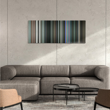 Gamer color palette canvas on a concrete wall above a gray sectional sofa