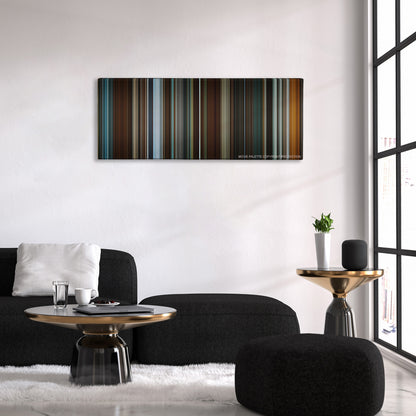 Predestination color palette canvas above a black sofa with a gold-topped table