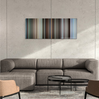Monty Python and the Holy Grail color palette canvas on a concrete wall above a gray sectional sofa