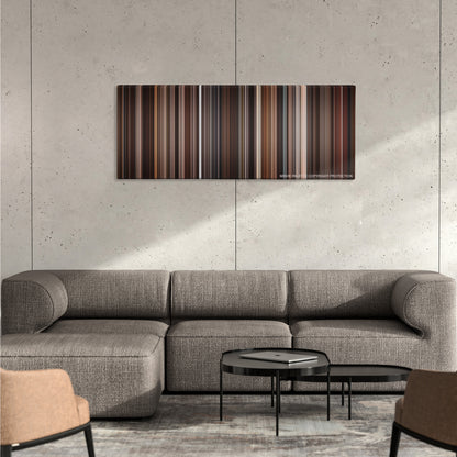 Once Upon a Time in America color palette canvas on a concrete wall above a gray sectional sofa