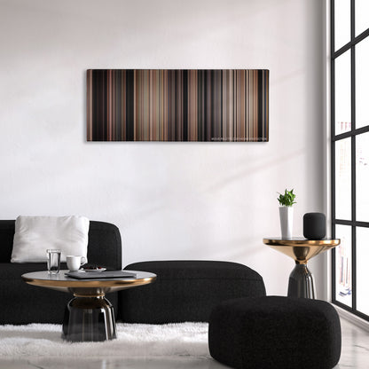 Hachi: A Dog's Tale color palette canvas above a black sofa with a gold-topped table