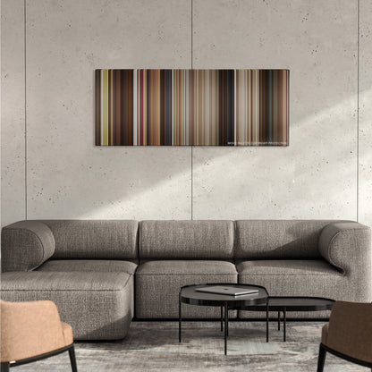 Let's Be Cops color palette canvas on a concrete wall above a gray sectional sofa