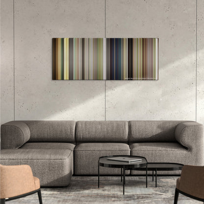 The Internship color palette canvas on a concrete wall above a gray sectional sofa