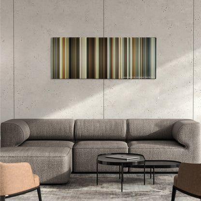 About Time color palette canvas on a concrete wall above a gray sectional sofa