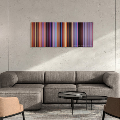 Speed Racer color palette canvas on a concrete wall above a gray sectional sofa