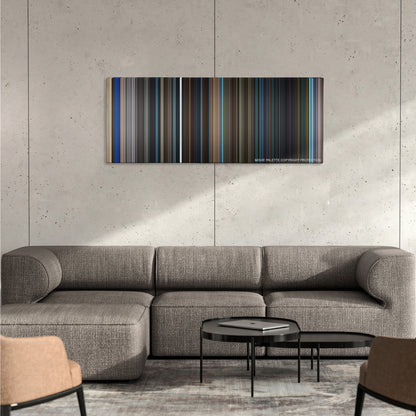 The Mortal Instruments: City of Bones color palette canvas on a concrete wall above a gray sectional sofa
