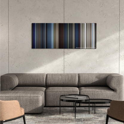 Solo: A Star Wars Story color palette canvas on a concrete wall above a gray sectional sofa