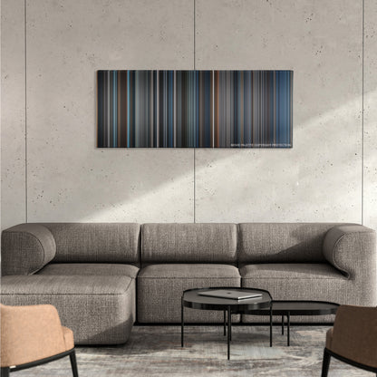 Sleepy Hollow color palette canvas on a concrete wall above a gray sectional sofa