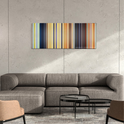 Spirit: Stallion of the Cimarron color palette canvas on a concrete wall above a gray sectional sofa