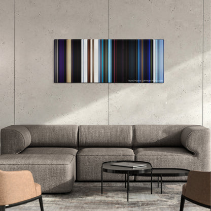 The Neon Demon color palette canvas on a concrete wall above a gray sectional sofa