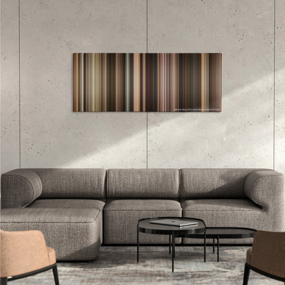 Last Vegas color palette canvas on a concrete wall above a gray sectional sofa