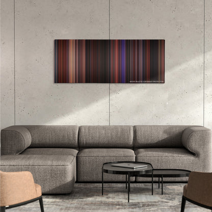 Hocus Pocus color palette canvas on a concrete wall above a gray sectional sofa