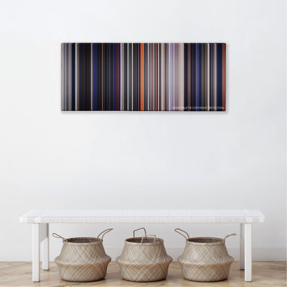 The Outsiders color palette canvas above a white bench with three woven baskets