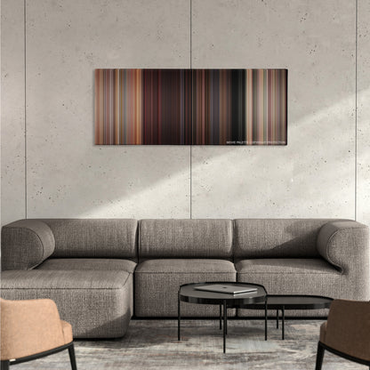 Sixteen Candles color palette canvas on a concrete wall above a gray sectional sofa