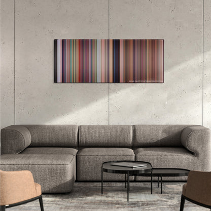 Space Jam color palette canvas on a concrete wall above a gray sectional sofa