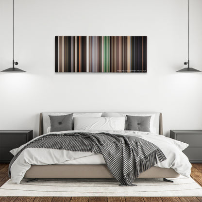 The Disaster Artist color palette canvas above a bed, between two black pendant lamps