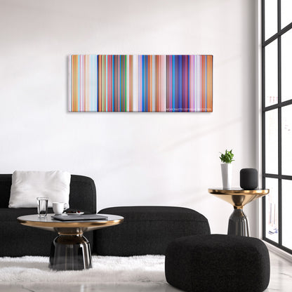 The Grinch color palette canvas above a black sofa with a gold-topped table