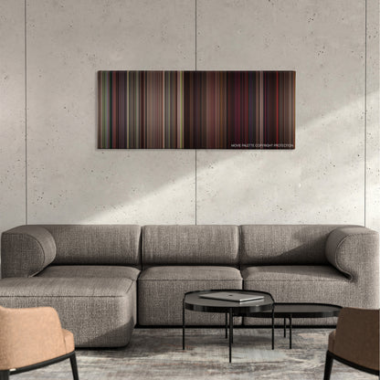 Grosse Pointe Blank color palette canvas on a concrete wall above a gray sectional sofa